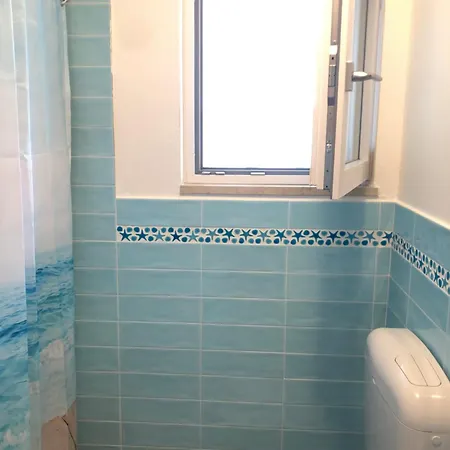 Giulio's - Beachfront Apartamento